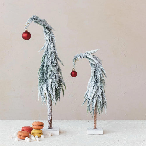 Snowy Leaning Grinch with Red Ornament